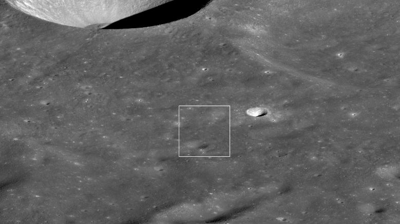 NASA says Danuri is in the white box near the right-hand corner of the image. If you can see it, you should consider becoming a citizen scientist. For perspective, the crater above the white box is 12 km (7.5 miles) wide. Image Credit: NASA/Goddard/Arizona State University