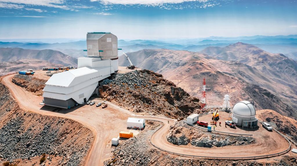 A drone view of the Rubin Observatory under construction in 2023. The 8.4-meter-tall observatory is nearing completion and first light in 2025. The observatory could provide answers to many outstanding issues, such as the existence of Planet Nine.  Image credit: Rubin Observatory/NSF/AURA/A.  Pizarro D